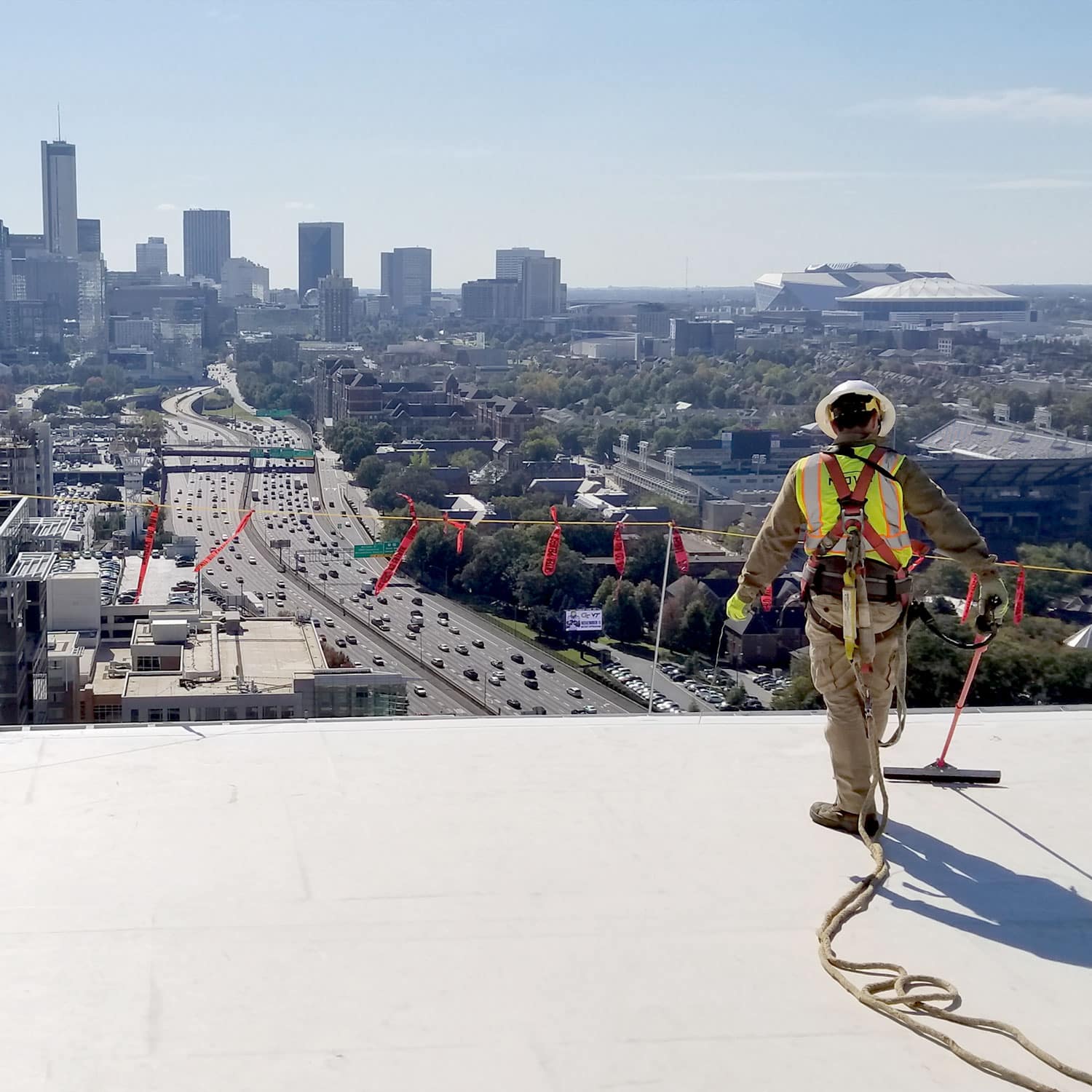 Construction worker on top of building